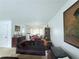 Comfortable living room featuring ample seating, artwork, and an adjacent dining area, ideal for relaxing and entertaining at 1979 Se Bencal Se Dr, Atlanta, GA 30316