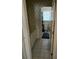 Cozy bathroom with tile flooring and patterned wallpaper, plus a toilet and vanity at 275 Rose Ivy Ct, Lawrenceville, GA 30043