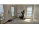 Spacious bedroom with three windows offering ample natural light at 275 Rose Ivy Ct, Lawrenceville, GA 30043