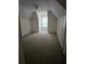Bright bedroom featuring neutral carpet, a vaulted ceiling and a sunny window at 275 Rose Ivy Ct, Lawrenceville, GA 30043
