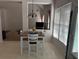 Cozy dining area with table, chairs, and natural light at 275 Rose Ivy Ct, Lawrenceville, GA 30043