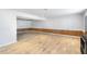 Unfurnished basement featuring tile flooring, wood-paneled walls, and ample space at 3274 Adelade Ct, Lithonia, GA 30038