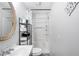 Cozy bathroom with vanity, toilet, and shower-tub combo with a curtain at 3274 Adelade Ct, Lithonia, GA 30038