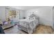 Bright bedroom with a comfortable bed, wood floors and a window to the outside at 3274 Adelade Ct, Lithonia, GA 30038
