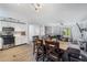 Open-concept space combining the dining area, kitchen and living room for seamless entertaining at 3274 Adelade Ct, Lithonia, GA 30038