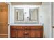 Bathroom with double sinks, granite countertops, and a walk-in closet providing ample storage at 2914 Lenox Ne Rd # 12, Atlanta, GA 30324