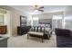 Inviting main bedroom with a large bed, stylish furniture, and lots of natural light at 2914 Lenox Ne Rd # 12, Atlanta, GA 30324