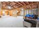 Unfinished basement with exposed framing and visible utilities at 3836 Alice Ln, Suwanee, GA 30024