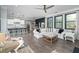 Open-concept living room with a kitchen and dining area creates a spacious and inviting atmosphere at 551 Rokeby Dr, Woodstock, GA 30188