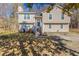Charming two-story home with a well-maintained lawn and inviting front entrance at 1059 Buckboard Ct, Douglasville, GA 30134