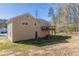 Rear exterior view of house featuring siding, deck, and outdoor space at 1059 Buckboard Ct, Douglasville, GA 30134