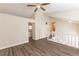 Bright and airy living room with hardwood floors and an open floor plan at 1059 Buckboard Ct, Douglasville, GA 30134