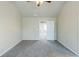 Neutral bedroom featuring gray carpeting and white trim at 169 Parkview Place Dr, Mcdonough, GA 30253