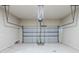 Spacious garage with a new door, ready for parking or storage at 169 Parkview Place Dr, Mcdonough, GA 30253