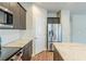 Gourmet kitchen with stainless steel appliances, granite countertops, and center island at 169 Parkview Place Dr, Mcdonough, GA 30253