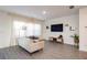 Comfortable living room with neutral tones, modern decor, and ample natural light at 1042 Edwin Ln, Sugar Hill, GA 30518