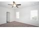Bright bedroom featuring new carpet and natural light from the windows at 290 Brighton Bend Ln, Acworth, GA 30102
