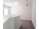 Second floor loft with neutral walls and carpeting at 290 Brighton Bend Ln, Acworth, GA 30102