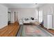 Bright bedroom with hardwood floors, shuttered windows, and built-in storage at 440 Dix Lee On Dr., Fayetteville, GA 30215