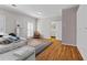 Sunlit bedroom with hardwood floors, shutters, and adjacent walk-in closet at 440 Dix Lee On Dr., Fayetteville, GA 30215