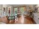 Warm and inviting living room with hardwood floors, glass table, and natural light at 440 Dix Lee On Dr., Fayetteville, GA 30215