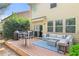 Cozy backyard patio featuring modern outdoor furniture, perfect for relaxing and entertaining guests at 1570 Lenox Overlook Ne Rd, Atlanta, GA 30329