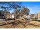 Scenic community space with mature trees, a bench, and well-maintained landscaping at 1570 Lenox Overlook Ne Rd, Atlanta, GA 30329