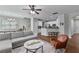 Open-concept living space combining the living, dining, and kitchen areas for modern living at 1570 Lenox Overlook Ne Rd, Atlanta, GA 30329