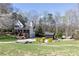 Charming two-story home with well-manicured lawn, mature trees and outbuildings at 158 Lambeth Dr, Hiram, GA 30141