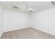 Spacious room features neutral carpet, white walls, and recessed lighting at 158 Lambeth Dr, Hiram, GA 30141