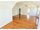 Spacious bedroom with hardwood floors, ceiling fan, and an ensuite bathroom at 1822 Hayden Mill Ct, Lawrenceville, GA 30043