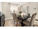 Cozy dining room with modern lighting and plenty of natural light at 2275 Holly Run Dr, Jonesboro, GA 30236