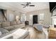 Bright living room with hardwood floors, neutral walls, and plenty of natural light at 2275 Holly Run Dr, Jonesboro, GA 30236