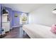 Cozy bedroom with ample natural light and stylish furnishings at 3876 Toccoa Falls Dr, Duluth, GA 30097
