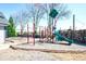 Community playground with swings, slides, and climbing structures for outdoor fun and recreation at 3876 Toccoa Falls Dr, Duluth, GA 30097