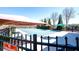 Community pool surrounded by an iron fence and trees at 3876 Toccoa Falls Dr, Duluth, GA 30097