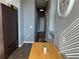 Compact dining area featuring a wooden table, stylish cabinets, and sleek flooring at 20 Marietta Nw St # 10E, Atlanta, GA 30303