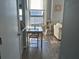 Cozy dining area with natural light and wood-look flooring in an open-concept layout at 20 Marietta Nw St # 10E, Atlanta, GA 30303