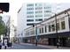 A view of an urban street showcasing nearby businesses and architecture at 20 Marietta Nw St # 10E, Atlanta, GA 30303
