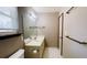 Bathroom with a large mirror, vanity with storage, and tiled floors at 494 Rue Montaigne, Stone Mountain, GA 30083