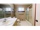 Bathroom with vanity, toilet, and shower/tub combo at 494 Rue Montaigne, Stone Mountain, GA 30083