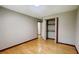 Bedroom featuring hardwood floors and closet for storage at 494 Rue Montaigne, Stone Mountain, GA 30083