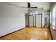 Bright bedroom with wood floors, ceiling fan, and dual closets offers ample storage space at 494 Rue Montaigne, Stone Mountain, GA 30083
