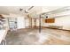 Spacious attached garage with overhead door and ample room for parking and storage at 494 Rue Montaigne, Stone Mountain, GA 30083