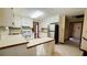 Bright kitchen with white cabinets, countertops and tile flooring at 494 Rue Montaigne, Stone Mountain, GA 30083