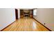 Living room featuring hardwood floors, fireplace, and built-in shelving at 494 Rue Montaigne, Stone Mountain, GA 30083