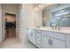 Stylish bathroom with double sinks and view to walk-in closet at 115 Laurelwood Ln, Dallas, GA 30157