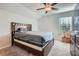 Bedroom features neutral carpet, natural light from the window and ceiling fan at 115 Laurelwood Ln, Dallas, GA 30157