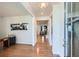 Bright foyer with hardwood floors leads into an open concept living area, with art on the wall at 115 Laurelwood Ln, Dallas, GA 30157