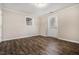Finished basement featuring vinyl flooring and a door to the exterior at 2404 Caneridge, Marietta, GA 30064